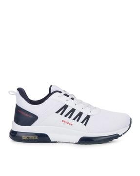 sports shoes with lace fastening