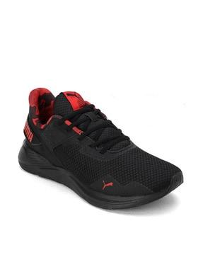 sports shoes with lace fastening