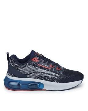 sports shoes with lace fastening