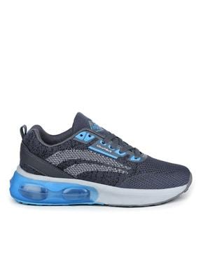 sports shoes with lace fastening