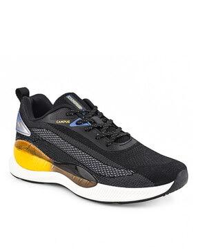 sports shoes with lace fastening