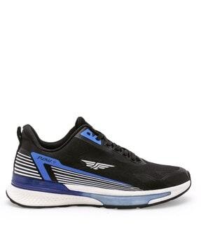 sports shoes with lace fastening