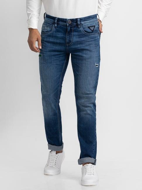 spykar blue cotton slim fit distressed jeans