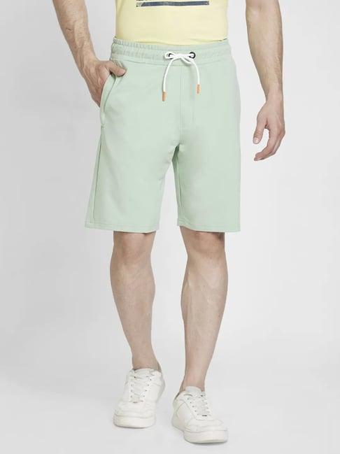 spykar dusty pista green  regular fit shorts