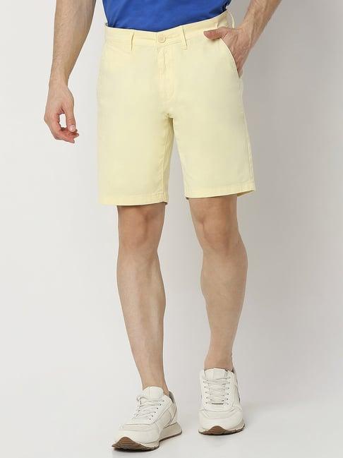 spykar light yellow regular fit shorts