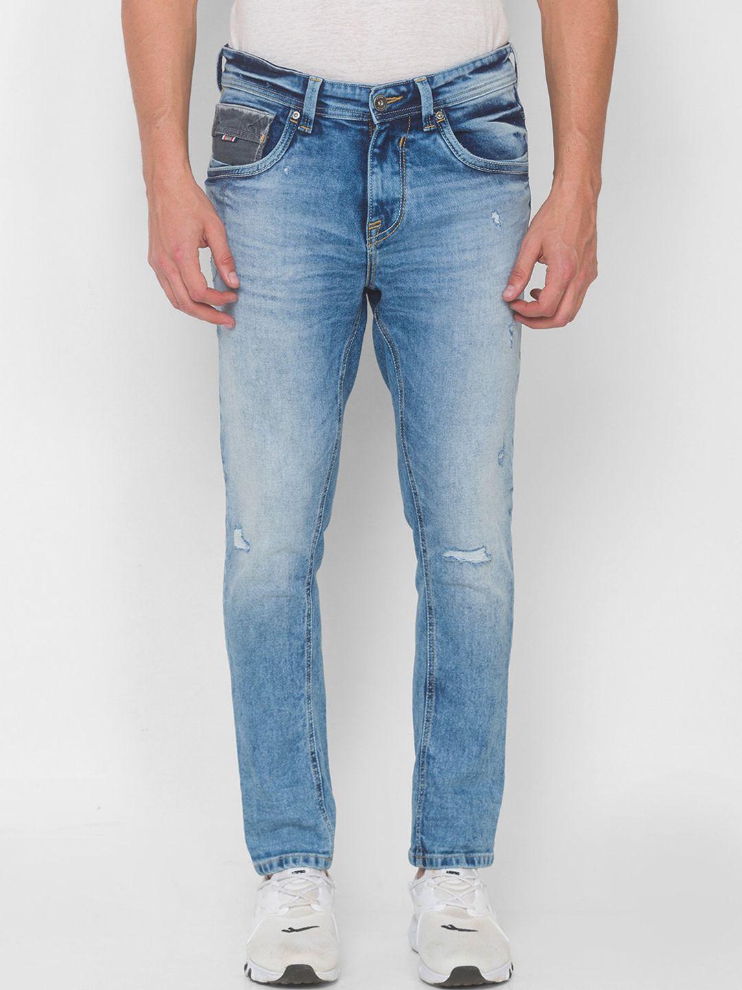 spykar men blue low-rise mildly distressed heavy fade jeans
