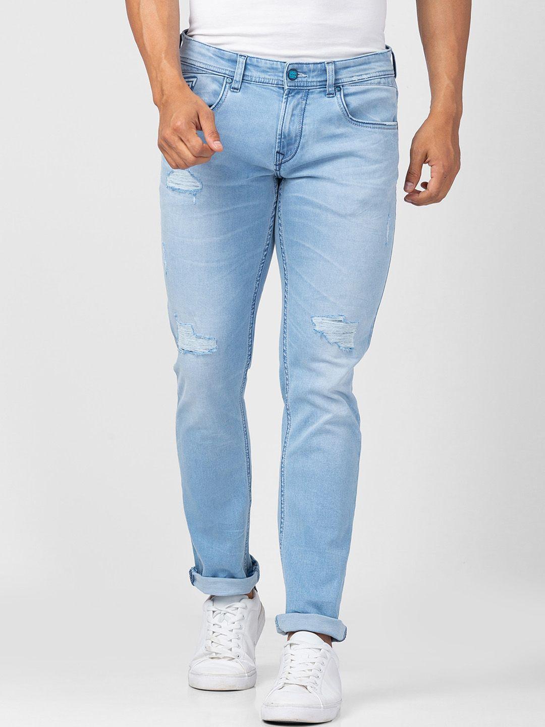 spykar men slim fit low-rise mildly distressed light fade jeans