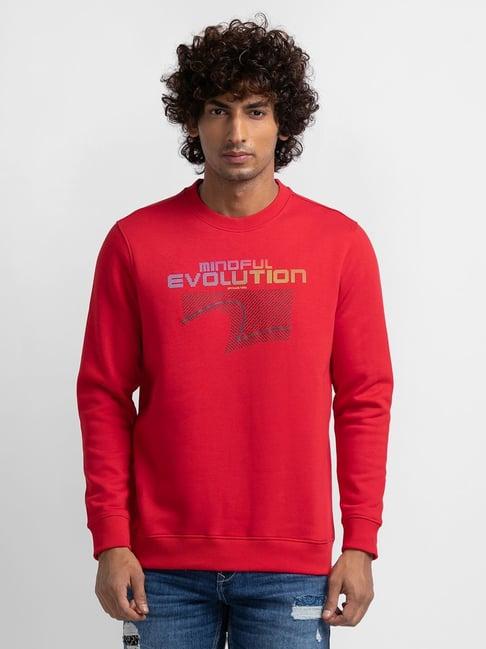 spykar red cotton slim fit printed sweatshirt