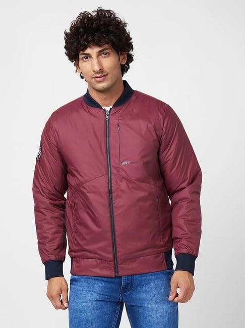 spykar wine red puffer reversible jacket with contrast slip patch on reverse side