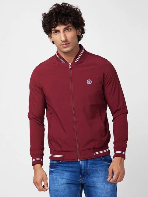 spykar wine red shell jacket with contrast rib tipping & branded label at chest