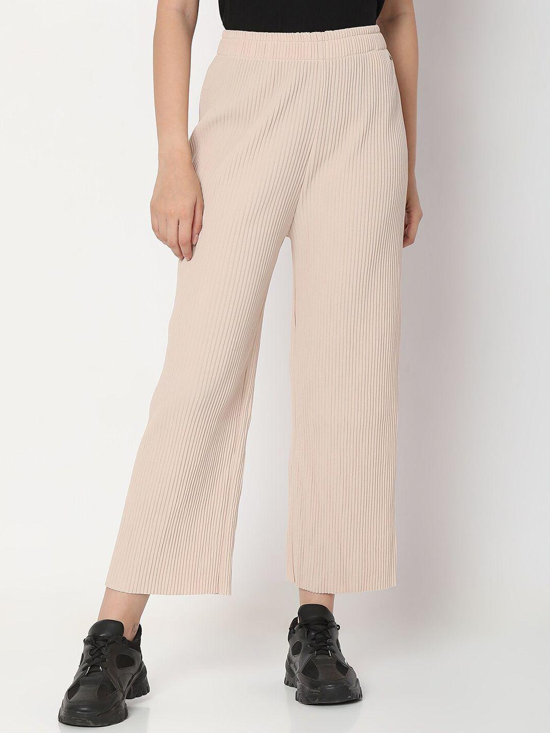 spykar women cream-colored solid cotton track pants