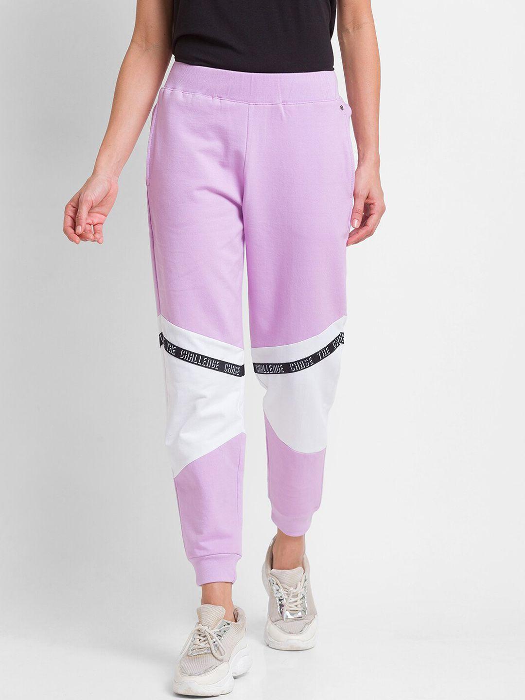 spykar women lavender & white color-blocked slim fit joggers