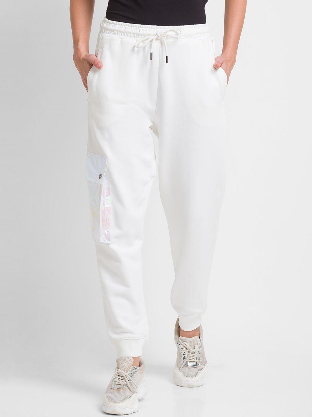 spykar women white solid cotton track pants