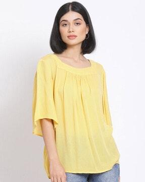 square-neck top with flared sleeves