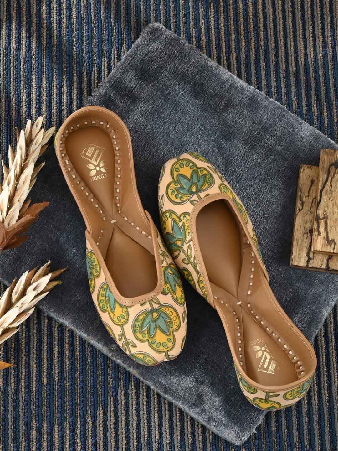 sringam women cream-coloured printed ethnic mojaris flats