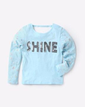 star print top with sequinned typography