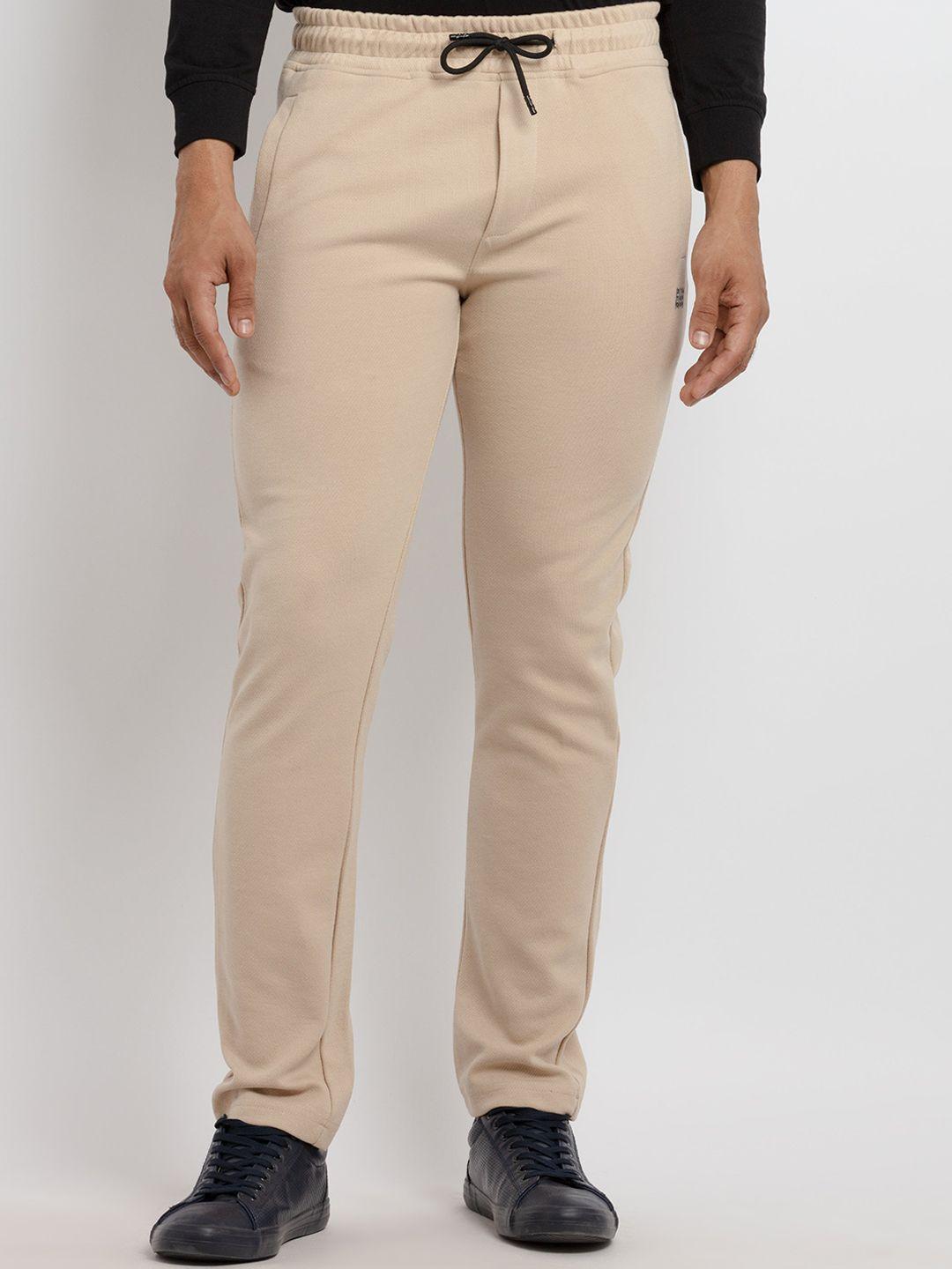 status quo men beige solid track pants