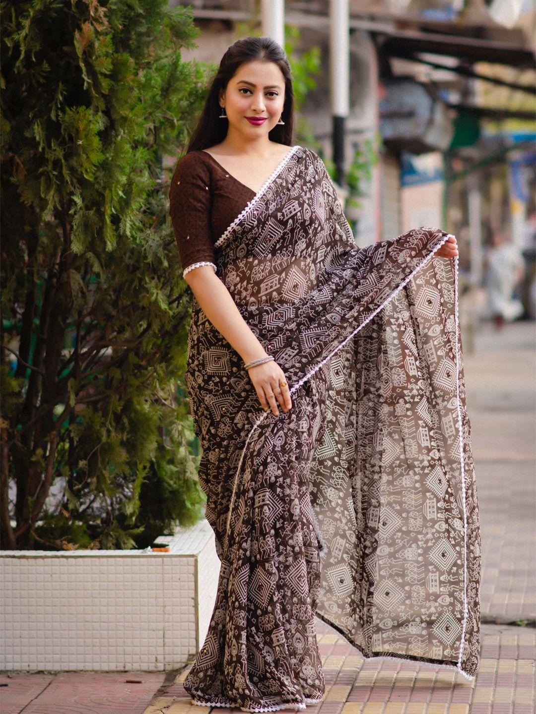 stava creation mirror work warli print saree