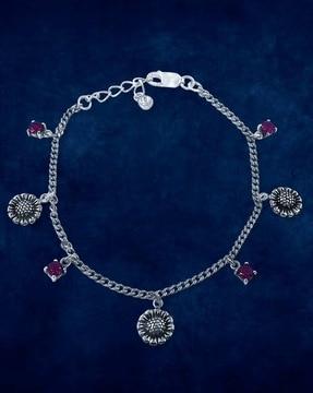 sterling silver cubic zirconia-studded floral charm bracelet