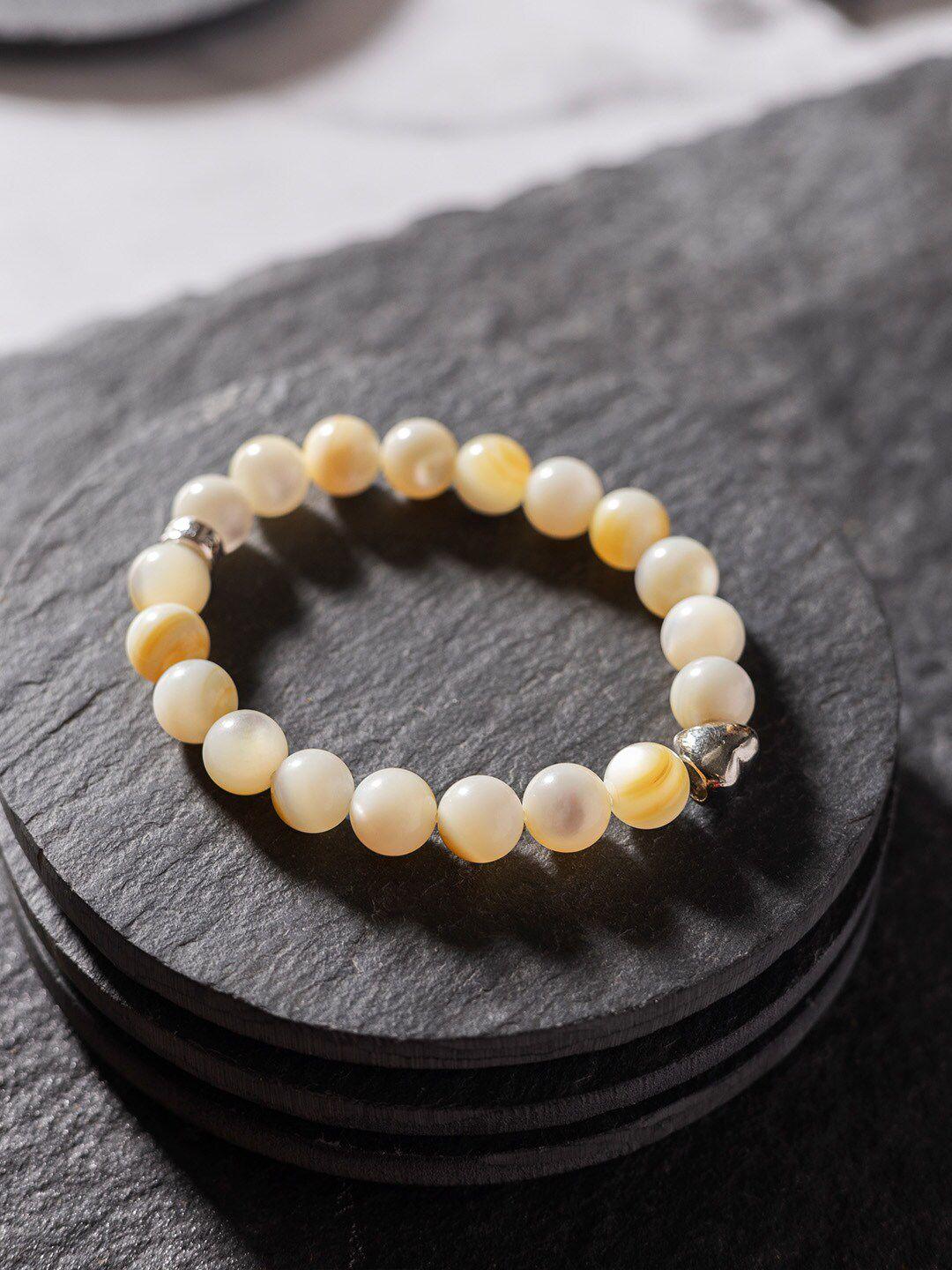 stone story by shruti women yellow sterling silver pearls handcrafted gold-plated charm bracelet