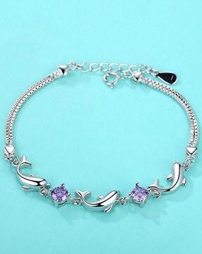 stone-studded bracelet with dolphin accent