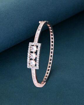 stone-studded cuff bracelet