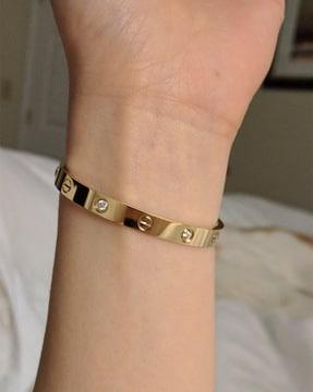stone-studded cuff bracelet