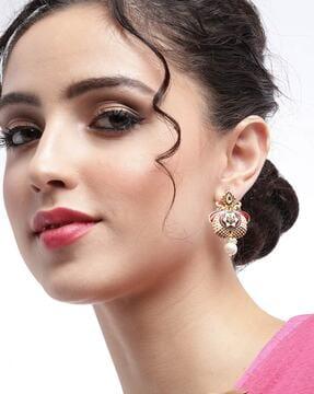 stone-studded drop earrings with pearls