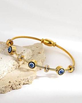 stone-studded gold-plated bracelet