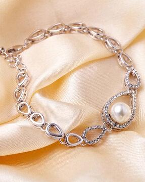 stone-studded pearl link bracelet