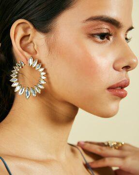 stone-studded peel earrings