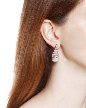 stone-studded stud earrings