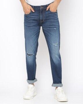 stone-wash distressed slim fit jeans