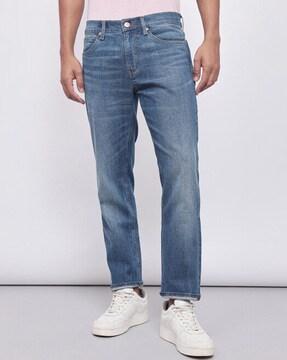 stone washed tapered fit jeans