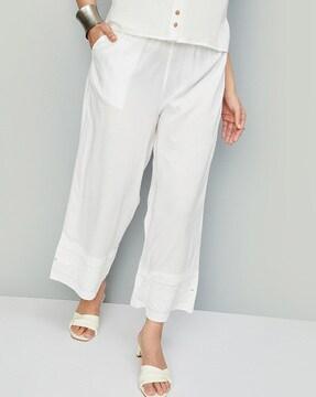 straight palazzos with embroidered hem