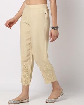 straight pants with embroidered hem
