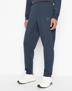straight track pants with brand print