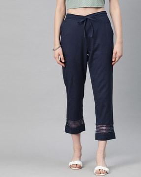 straight fit flat-front trousers with lace detail