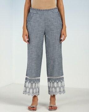 straight fit palazzos with embroidered hem