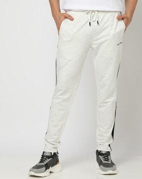 straight fit track pants with contrast piping