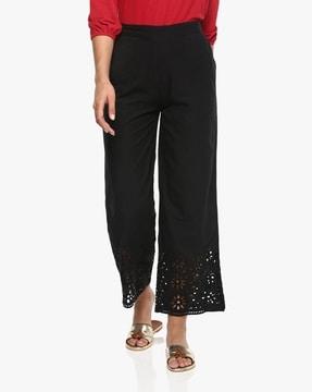 straight palazzos with schiffli embroidered hems