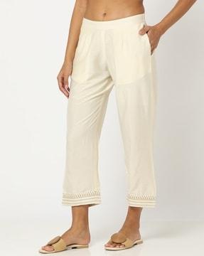 straight pants with embroidered hem