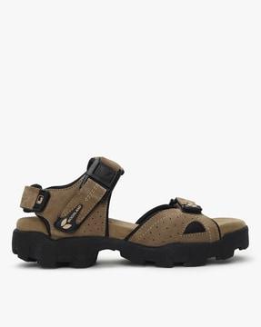 strappy slip-on sandals with velcro fastening