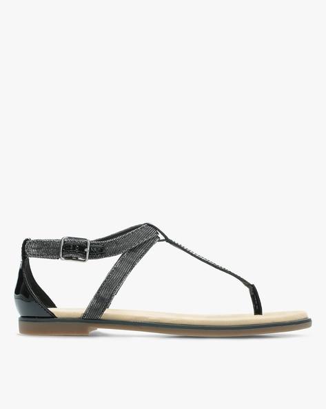 strappy flat sandals with buckle closure