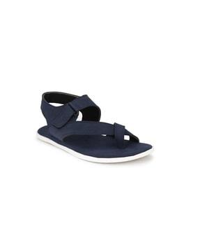 strappy flat sandals with velcro fastening