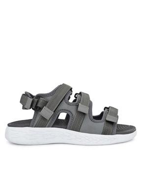 strappy flat sandals with velcro fastening