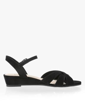 strappy heeled sandals with buckle closure