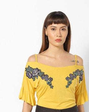 strappy top with floral embroidery