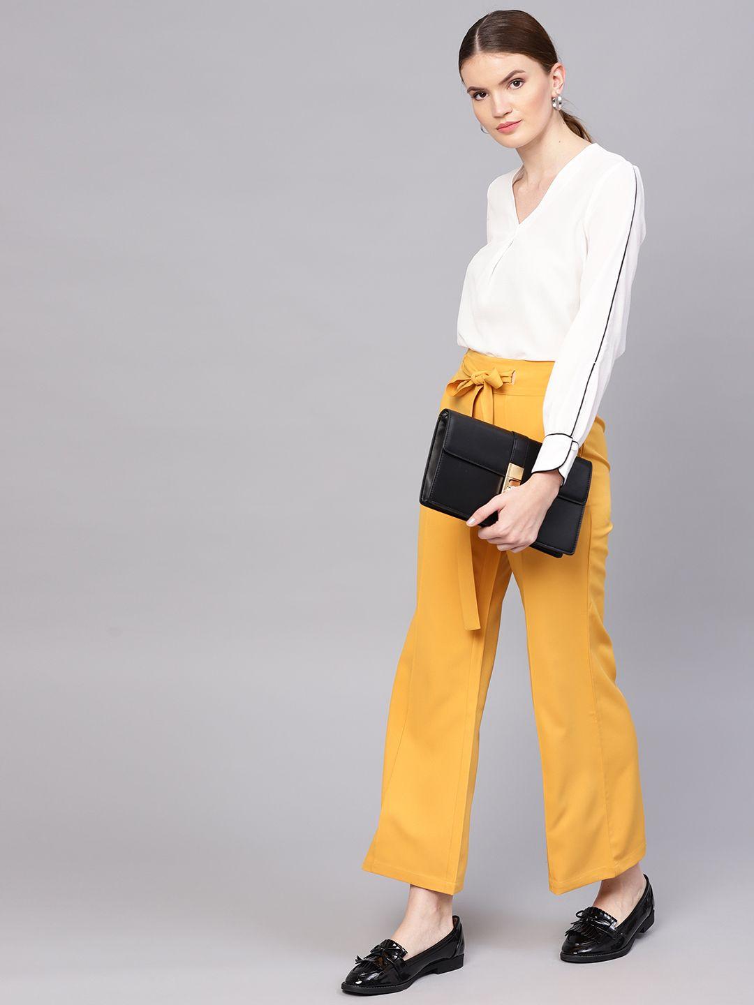 street 9 women mustard yellow solid regular fit parallel trousers