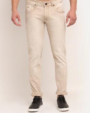 stretchable slim fit tapered jeans